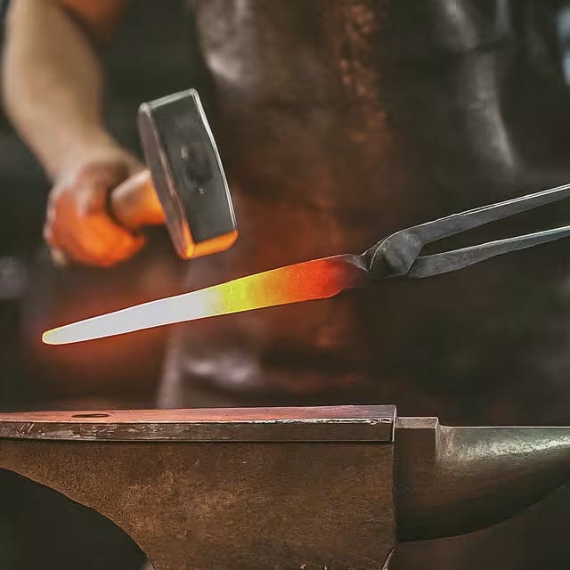 The Role of Tongs in Blacksmithing Image